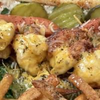 Shrimp Po Boy Sandwich  · Toasted hoagie with Chipotle mayo lettuce tomato grilled or fried large shrimp melted cheese...