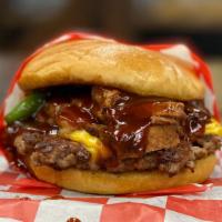 Brisket Burger (Combo) · 1/3 ground beef with melted American cheese, topped with smoked brisket and grilled onions, ...