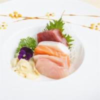 Sashimi Sampler (5) · Five pieces chef's choice assorted sashimi. Served with chef's special sauce.