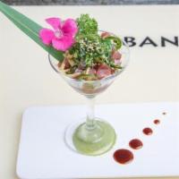 Tuna Martini · Cubed tuna, seaweed salad, cucumber, and jalapeños. Served with chef's special sauce.