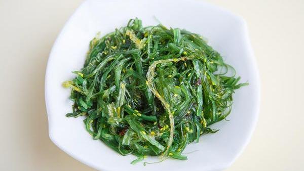 Seaweed Salad · Marinated green seaweed with sesame seeds.