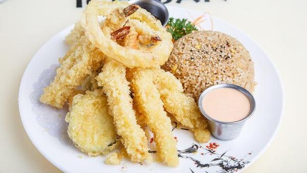 Shrimp Tempura Dinner · Lightly battered and fried with homemade tempura sauce. Served with your choice of soup or salad and rice.
