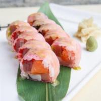 Tokyo Roll · Crab, tuna, yellowtail, salmon, white fish, and (three) different kinds of tobiko. Wrapped i...