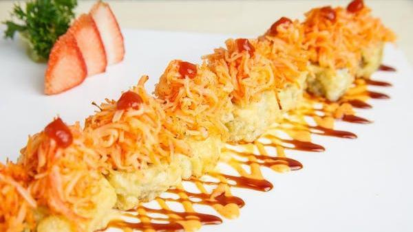 Spicy Girl Roll · Spicy. Spicy yellowtail, cream cheese, and avocado. Rolled and deep-fried then topped with spicy crab and spicy scallops. No substitutions.