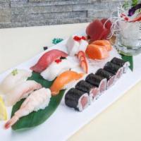 Sushi & Sashimi Combo · Six pieces of chef's choice assorted sashimi, six pieces of sushi, and one tuna roll. Served...