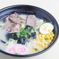 Tokyo Tonkotsu Ramen · Thick, white broth simmered with pork belly and bones. Served with traditional curly ramen n...