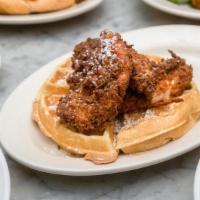 Chicken & Waffle · Buttermilk fried chicken on a Belgian waffle, topped with maple syrup.