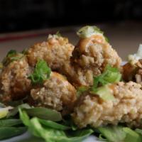 Fried Oyster App · One. Lb deep-fried, then topped with our Elizabeth river remoulade, and scallions.