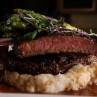 New York Strip · 10 oz NY strip seasoned and seared accompanied with our delicious whipped potatoes and aspar...