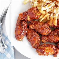 5 Pc Wings · Tossed in your choice of Breaded, Hot, or Barbecue Wings.