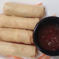 Crispy Spring Rolls · Thin crepe wrapped with mixed cabbage, carrots