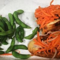 Banh Mi · French baquette, grilled pork, pork belly, jalapeño, cilantro, cucumber, carrot and radish p...