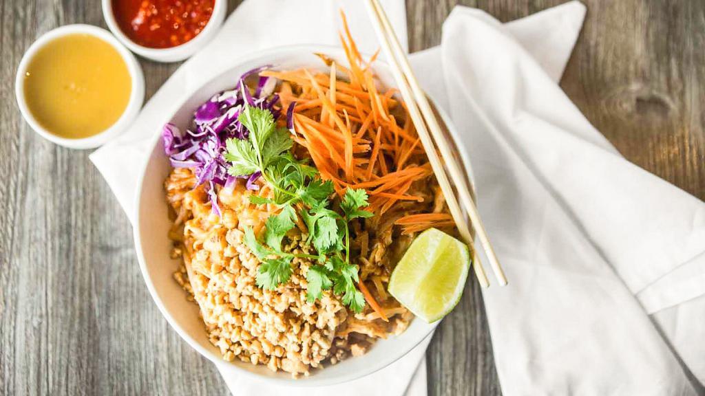 Pad Thai · Thin rice noodles with tamarind sauce, served with bean sprouts, lime wedge, peanuts and cilantro. Your choice of tofu, chicken, veg. beef and shrimp add $2,  seafood add $4