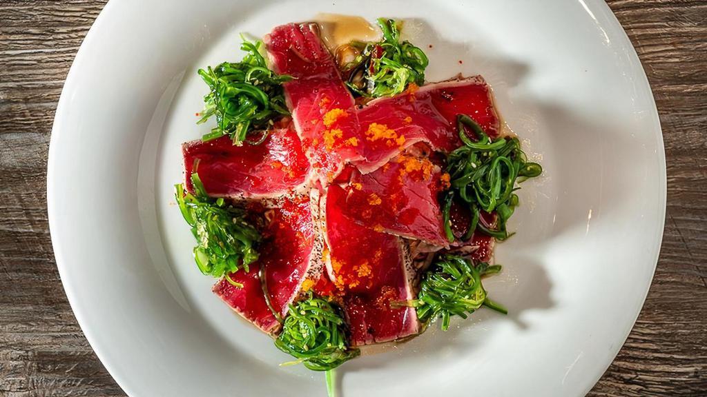 *Tuna Tataki · Seared tuna With wasabi yuzu sauce,scallion,seaweed salad.