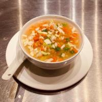 Sweet Corn Soup Veg · Thick starchy sweet corn soup with chopped vegetables.