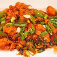 A10 . Wof Chili Chicken Dry · Diced fried chicken seasoned with burnt garlic & chef’s chili paste.