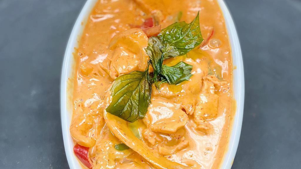 Thai Red Curry Veg · Red curry paste cooked in coconut milk & vegetables like green and red bell peppers, onions, mushrooms