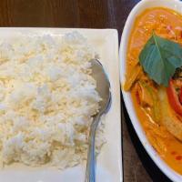 Thai Red Curry Chicken · Red curry paste cooked in coconut milk, chicken & vegetables.