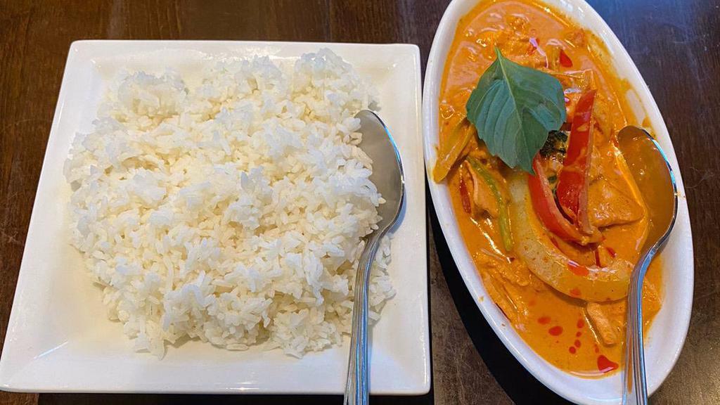 Thai Red Curry Shrimp · Red curry paste cooked in coconut milk, shrimp & vegetables.