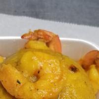 Mofongos · mashed and stuffed fried green plantains. Your choice of one meat.