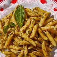 Italian Penne Pesto · Al Dente Penne , house made creamy pesto sauce, topped with grated parmesan cheese.