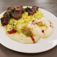 Shish Kabob Lamb · Chunks of lamb marinated with olive oil. Herbs and spices grilled to perfection.