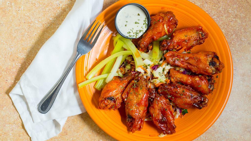 Wings · Gluten Free. Your choice of lemon and herb, medium, hot, or hot honey buffalo served on a bed of Asian slaw.