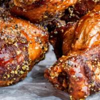 Medium Chicken Wings · 10 delicious fresh jumbo chicken wings, brined for 24 hours in love and spices, then fried t...