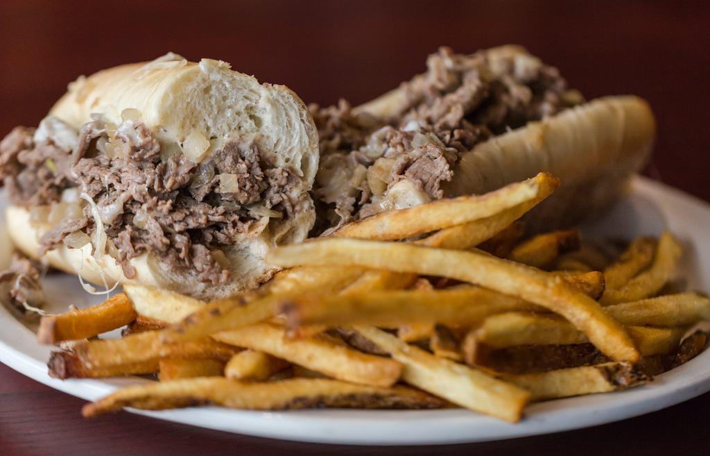 Original Philly Cheesesteak · Steak, grilled onions & choice of cheese.