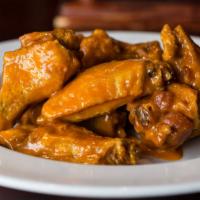 Traditional Jumbo Wings (10) · Award-Winning jumbo wings cooked fresh to order & served with house-made blue cheese or ranch.