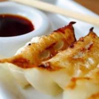 Spicy Dumplings · Spicy. Spicy: sharp, fiery taste. (6 pc.) extra spicy. Shrimp and chicken dumplings in spicy...