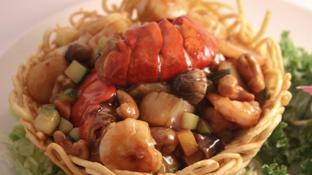 W. Lin'S Lo Mein · Onions, carrots, cabbage, and scallions cooked in a homemade ginger sauce.