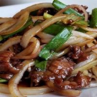 Mongolian Beef · Stir-fried flank steak, onions, and scallions with hoisin sauce and sweet soy sauce.
