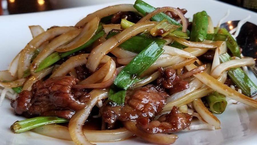 Mongolian Beef · Stir-fried flank steak, onions, and scallions with hoisin sauce and sweet soy sauce.