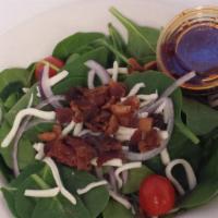 Emily'S Spinach Salad · Spinach, red onions, bacon, white cheese, croutons, seasonal tomatoes, and house-made vinaig...