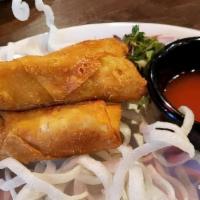 Egg Rolls · Pork and vegetable egg rolls served with sweet and sour sauce.