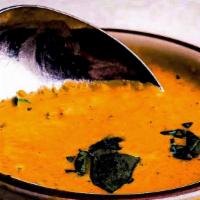 Madras Soup · Coconut tomato soup made with a dash of Indian spices.