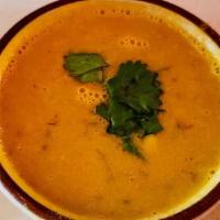 Dal Soup · Yellow lentils cooked with fresh garlic, ginger, turmeric and spices.