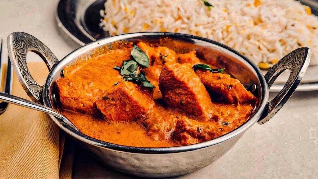 Chicken Tikka Masala · Boneless white meat chicken cooked with tomatoes & herb sauce