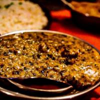 Saag Gosht · Lamb cooked in a homemade creamed spinach with a touch of curry sauce.