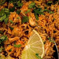 Lamb Biryani · Finest basmati rice cooked with lamb and a touch of curry sauce garnished with nuts and rais...