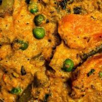 Vegetable Korma · Nine fresh vegetables cooked with a mild creamy sauce.
