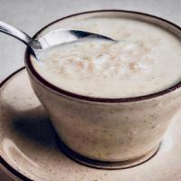 Kheer Badami · Traditional Indian rice pudding made with milk, raisins, and nuts.