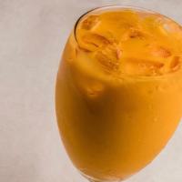 Mango Lassi · A special blend of mangoes and yogurt.