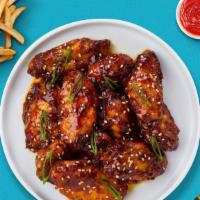 Teriyaki Wings · Classic bone-in wings oven-baked, cooked to order perfectly crisp, tossed in our house made ...