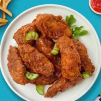 Mild Boneless Wings · Breaded boneless chicken breast chunks fried to perfection, tossed in our house made mild sa...