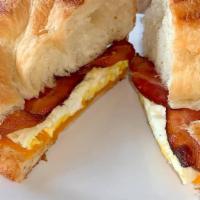 Bacon Egg & Cheese Croissant · Served on a fresh baked croissant, with thick cut applewood smoked bacon, fresh cracked egg,...
