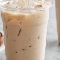 Iced Dirty Chai Latte · Bold black tea with cardamom, cinnamon, ginger, vanilla, and star anise to deliver a robust,...