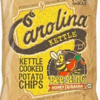 Bee Sting Honey Sriracha Carolina Kettle Cooked Potato Chips · Catch the Buzz! Our Bee Sting Honey Sriracha Flavored Chips contain the ultimate pairing of ...