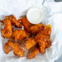 Wings Of Delight (10 Count) · 10 count baked breaded wings with your choice of flavor and your choice of either homemade r...